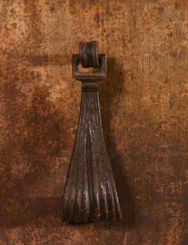doorknocker  17th c. Spain S. Yellin coll. l. 10.5 cm -W. 3.5 cm  with 10 cm nail to attach knocker in the door.  € 150,--